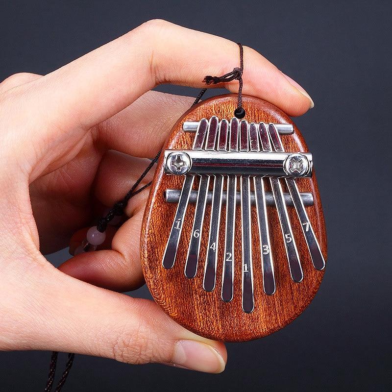 Musikari® | Mini Kalimba tummepiano i trä